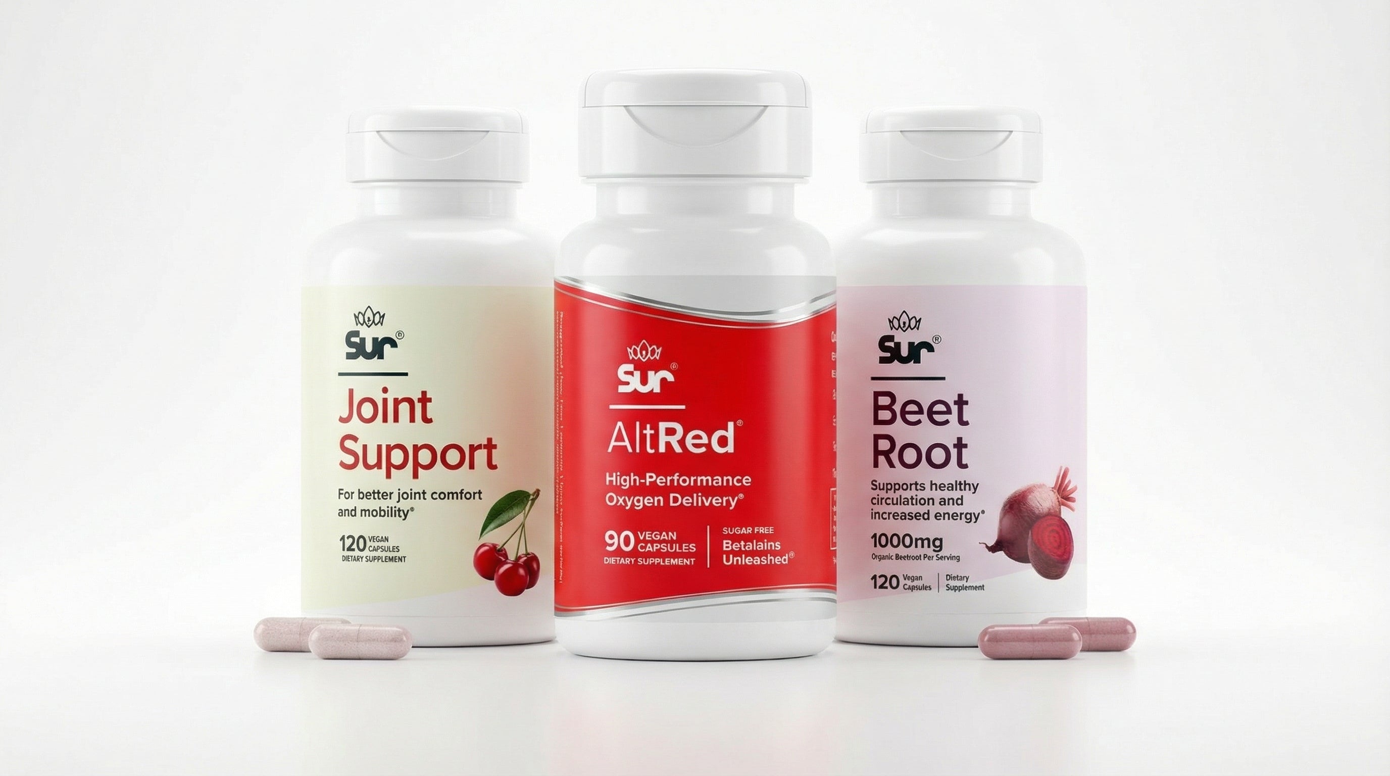 Three supplement bottles labeled 'Joint Support', 'AltRed', and 'Beet Root' on a white background.